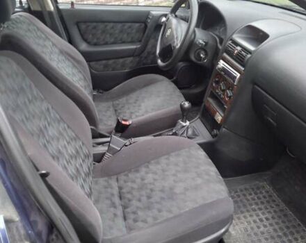 Синий Опель Астра, объемом двигателя 2 л и пробегом 225 тыс. км за 3000 $, фото 7 на Automoto.ua