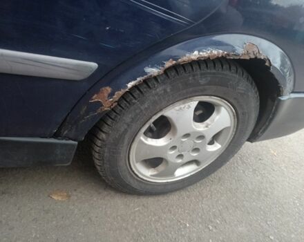 Синій Опель Астра, об'ємом двигуна 2 л та пробігом 323 тис. км за 2050 $, фото 4 на Automoto.ua