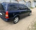 Синий Опель Астра, объемом двигателя 2 л и пробегом 230 тыс. км за 2900 $, фото 5 на Automoto.ua