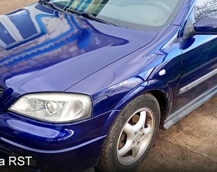 Синий Опель Астра, объемом двигателя 2 л и пробегом 250 тыс. км за 2950 $, фото 1 на Automoto.ua