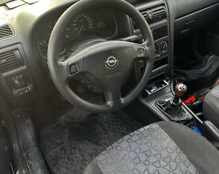 Синий Опель Астра, объемом двигателя 2 л и пробегом 300 тыс. км за 1650 $, фото 2 на Automoto.ua