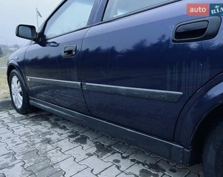 Синий Опель Астра, объемом двигателя 1.7 л и пробегом 270 тыс. км за 2799 $, фото 26 на Automoto.ua