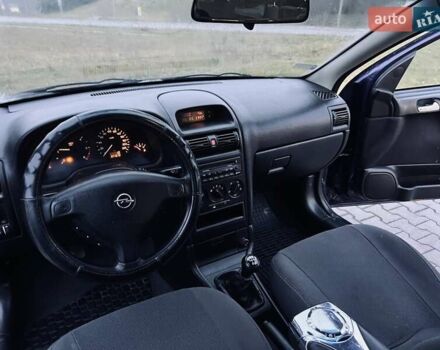 Синий Опель Астра, объемом двигателя 1.7 л и пробегом 270 тыс. км за 2799 $, фото 21 на Automoto.ua