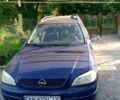 Синий Опель Астра, объемом двигателя 2 л и пробегом 338 тыс. км за 3500 $, фото 1 на Automoto.ua