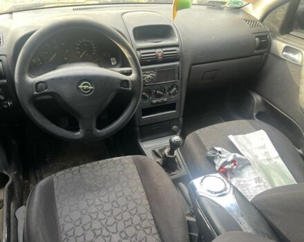 Синий Опель Астра, объемом двигателя 2 л и пробегом 260 тыс. км за 850 $, фото 4 на Automoto.ua