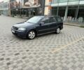 Синий Опель Астра, объемом двигателя 2 л и пробегом 318 тыс. км за 3450 $, фото 1 на Automoto.ua