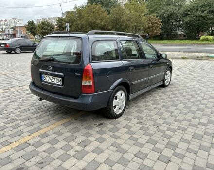 Синий Опель Астра, объемом двигателя 2 л и пробегом 318 тыс. км за 3450 $, фото 5 на Automoto.ua