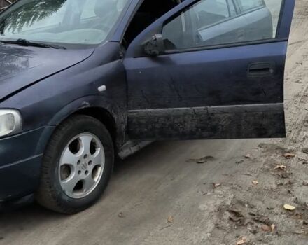 Синий Опель Астра, объемом двигателя 2 л и пробегом 300 тыс. км за 870 $, фото 1 на Automoto.ua