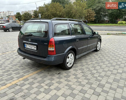 Синий Опель Астра, объемом двигателя 2 л и пробегом 318 тыс. км за 3450 $, фото 6 на Automoto.ua