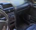 Синій Опель Астра, об'ємом двигуна 2 л та пробігом 300 тис. км за 1009 $, фото 1 на Automoto.ua