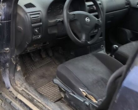 Синий Опель Астра, объемом двигателя 2 л и пробегом 300 тыс. км за 870 $, фото 3 на Automoto.ua