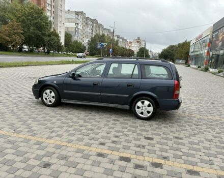 Синий Опель Астра, объемом двигателя 2 л и пробегом 318 тыс. км за 3450 $, фото 2 на Automoto.ua
