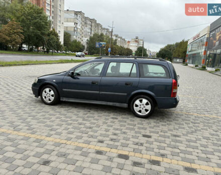 Синий Опель Астра, объемом двигателя 2 л и пробегом 318 тыс. км за 3450 $, фото 3 на Automoto.ua
