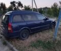Синий Опель Астра, объемом двигателя 1.7 л и пробегом 400 тыс. км за 3000 $, фото 1 на Automoto.ua