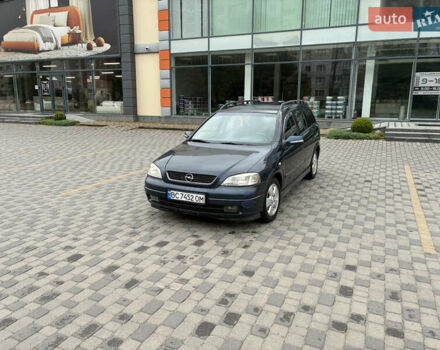 Синий Опель Астра, объемом двигателя 2 л и пробегом 318 тыс. км за 3450 $, фото 1 на Automoto.ua