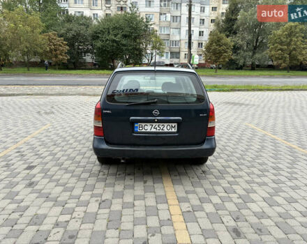 Синий Опель Астра, объемом двигателя 2 л и пробегом 318 тыс. км за 3450 $, фото 5 на Automoto.ua