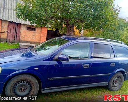 Синий Опель Астра, объемом двигателя 2 л и пробегом 245 тыс. км за 3200 $, фото 1 на Automoto.ua
