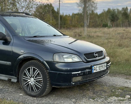 Синий Опель Астра, объемом двигателя 2 л и пробегом 250 тыс. км за 2350 $, фото 1 на Automoto.ua