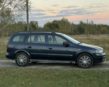 Синий Опель Астра, объемом двигателя 2 л и пробегом 250 тыс. км за 2350 $, фото 2 на Automoto.ua