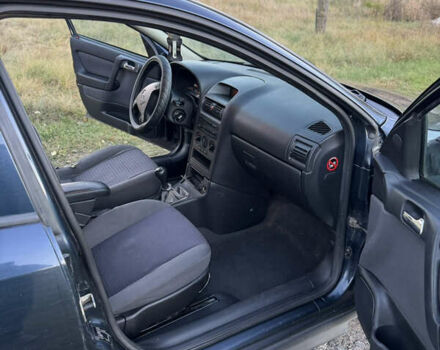 Синий Опель Астра, объемом двигателя 2 л и пробегом 250 тыс. км за 2350 $, фото 15 на Automoto.ua