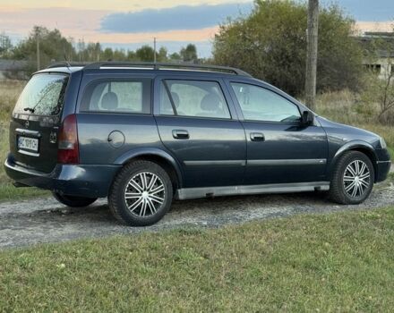 Синий Опель Астра, объемом двигателя 2 л и пробегом 250 тыс. км за 2350 $, фото 3 на Automoto.ua