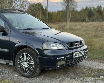 Синий Опель Астра, объемом двигателя 2 л и пробегом 250 тыс. км за 2350 $, фото 1 на Automoto.ua