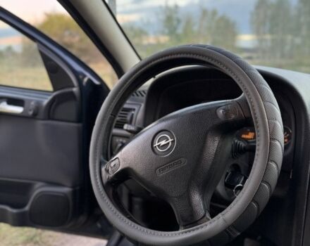 Синий Опель Астра, объемом двигателя 2 л и пробегом 250 тыс. км за 2350 $, фото 17 на Automoto.ua