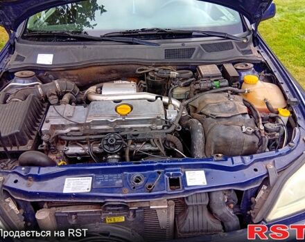 Синий Опель Астра, объемом двигателя 2 л и пробегом 245 тыс. км за 3200 $, фото 2 на Automoto.ua