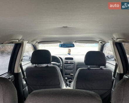 Синий Опель Астра, объемом двигателя 1.69 л и пробегом 353 тыс. км за 3500 $, фото 11 на Automoto.ua