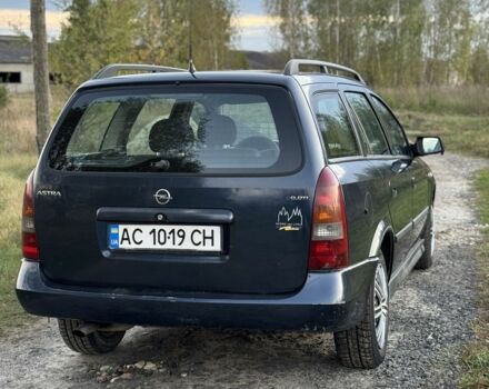 Синий Опель Астра, объемом двигателя 2 л и пробегом 250 тыс. км за 2350 $, фото 4 на Automoto.ua