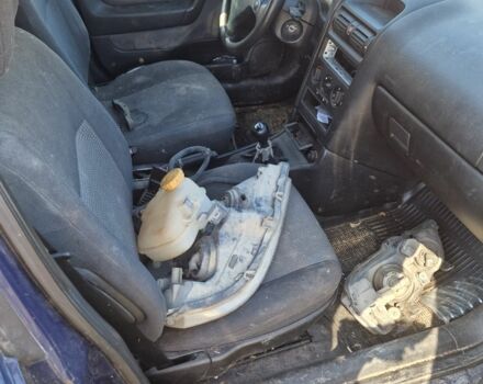 Синий Опель Астра, объемом двигателя 1.7 л и пробегом 220 тыс. км за 500 $, фото 3 на Automoto.ua