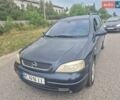 Синій Опель Астра, об'ємом двигуна 2 л та пробігом 300 тис. км за 1599 $, фото 1 на Automoto.ua