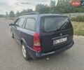 Синій Опель Астра, об'ємом двигуна 2 л та пробігом 300 тис. км за 1599 $, фото 3 на Automoto.ua