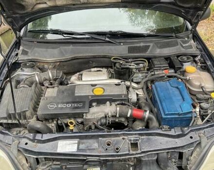 Синий Опель Астра, объемом двигателя 2 л и пробегом 390 тыс. км за 2200 $, фото 4 на Automoto.ua