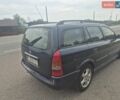 Синій Опель Астра, об'ємом двигуна 2 л та пробігом 300 тис. км за 1599 $, фото 6 на Automoto.ua