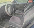 Синій Опель Астра, об'ємом двигуна 2 л та пробігом 300 тис. км за 1599 $, фото 10 на Automoto.ua
