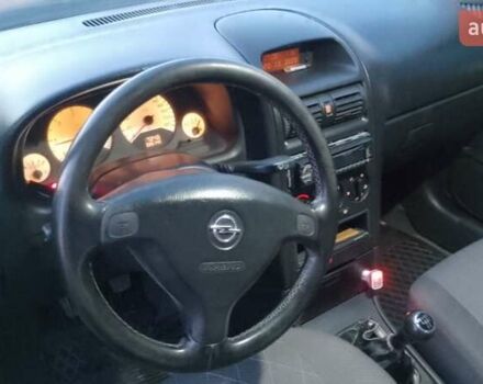 Синий Опель Астра, объемом двигателя 1.7 л и пробегом 350 тыс. км за 2300 $, фото 4 на Automoto.ua