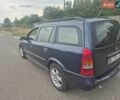 Синій Опель Астра, об'ємом двигуна 2 л та пробігом 300 тис. км за 1799 $, фото 6 на Automoto.ua