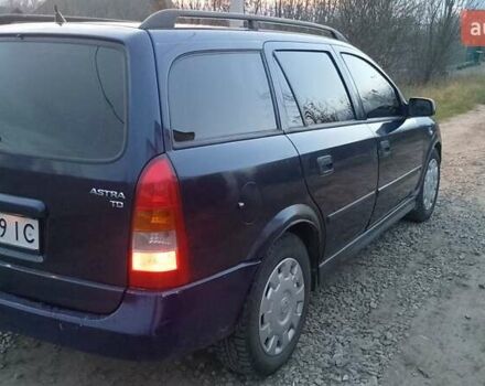 Синий Опель Астра, объемом двигателя 1.7 л и пробегом 350 тыс. км за 2300 $, фото 6 на Automoto.ua