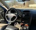 Синий Опель Астра, объемом двигателя 1.8 л и пробегом 321 тыс. км за 2400 $, фото 12 на Automoto.ua