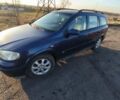 Синий Опель Астра, объемом двигателя 2 л и пробегом 369 тыс. км за 3300 $, фото 1 на Automoto.ua
