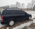 Синий Опель Астра, объемом двигателя 2 л и пробегом 315 тыс. км за 95000 $, фото 1 на Automoto.ua
