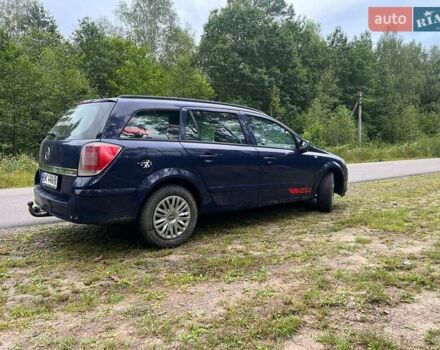 Синий Опель Астра, объемом двигателя 1.7 л и пробегом 240 тыс. км за 3750 $, фото 2 на Automoto.ua