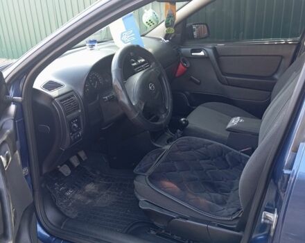 Синий Опель Астра, объемом двигателя 1 л и пробегом 260 тыс. км за 3400 $, фото 5 на Automoto.ua