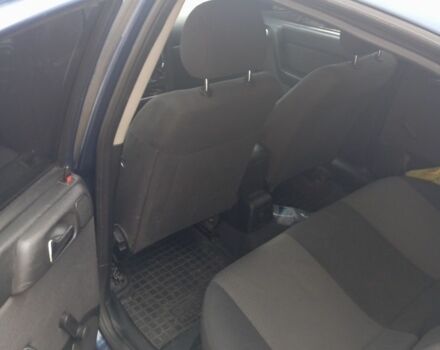 Синий Опель Астра, объемом двигателя 1 л и пробегом 260 тыс. км за 3400 $, фото 1 на Automoto.ua