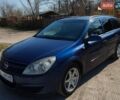 Синий Опель Астра, объемом двигателя 1.7 л и пробегом 326 тыс. км за 4000 $, фото 1 на Automoto.ua