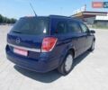 Синий Опель Астра, объемом двигателя 1.4 л и пробегом 179 тыс. км за 4950 $, фото 9 на Automoto.ua