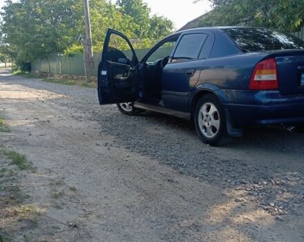 Синий Опель Астра, объемом двигателя 1 л и пробегом 260 тыс. км за 3400 $, фото 6 на Automoto.ua