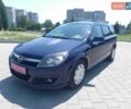 Синий Опель Астра, объемом двигателя 1.4 л и пробегом 179 тыс. км за 4950 $, фото 2 на Automoto.ua