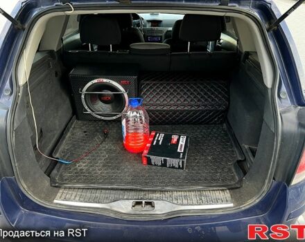 Синий Опель Астра, объемом двигателя 1.9 л и пробегом 320 тыс. км за 5000 $, фото 7 на Automoto.ua